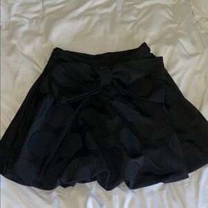 Maeve Elegant Black Mini Skirt with Bow Detail